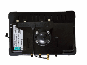 Rear view of a black electronic control module with a white label, mounting screws, and brass fittings along the bottom edge.