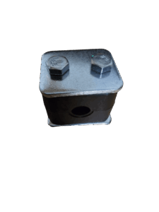 Close-up of a metallic base plate with two hex nuts on top, set against a black background.