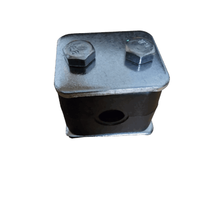 Close-up of a metallic base plate with two hex nuts on top, set against a black background.
