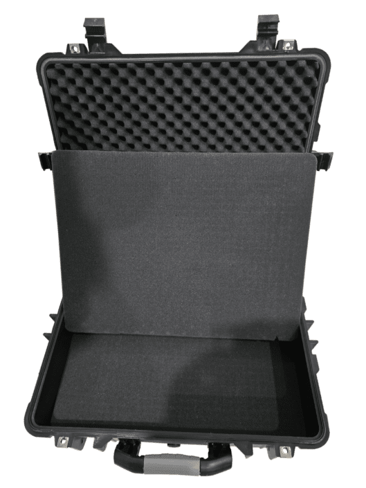 20240809_171627-1-e1723261351831-529x705-1png Open hard protective case with egg-crate foam lid and empty lower compartment on a blank background.